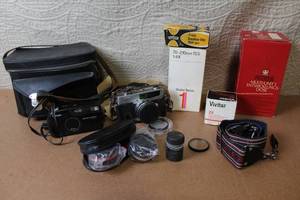 lot 17 image: Vintage Petri 7s and Canon Sure Shot Cameras with Lenses and Accessories