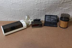 lot 25 image: Vintage Electronics Lot Sharp Memo Master Alarm, Spartus Clock, GE Battery Charger, Grinder