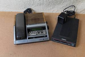 lot 26 image: General Electric FMAM Clock Radio Telephone and USRobotics Courier Modem Set