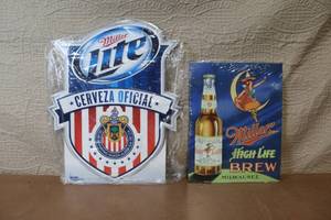 lot 48 image: Miller Lite Cerveza Oficial and Miller High Life Brew Metal Beer Signs Set