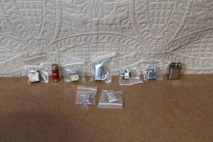 lot 106 image: Collection of 10 Vintage Pocket Lighters and Accessories