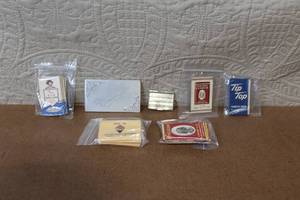 lot 109 image: Collection of Vintage Cigarette Paper Packs and Metal Holders