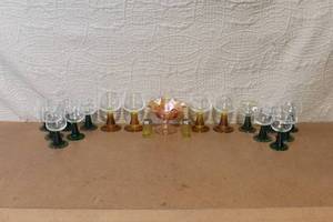 lot 155 image: Vintage Colored Glassware Collection with Goblets, Compote, and Shakers