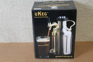 lot 167 image: uKeg 64 Stainless Steel Pressurized Growler with CO2 Chargers