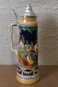 lot 182 image: German Beer Stein with Pewter Lid and Relief Scene Tanz auf der Alm