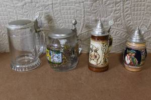 lot 184 image: Set of 4 German Beer Steins with Pewter Lids Assorted Designs