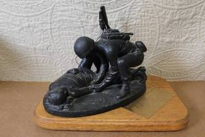lot 188 image: Military Medic Service Appreciation Sculpture with Wood Base and Plaque