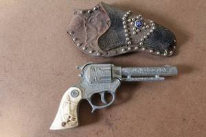 lot 198 image: Vintage Western Style Toy Cap Gun with Embossed Leather Holster
