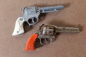 lot 200 image: Lot of 2 Vintage Hubley Cap Guns with Western Engraving