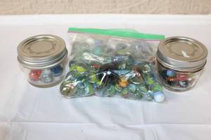 lot 222 image: Large Assorted Collection of Vintage and Modern Glass Marbles in Jars and Bag
