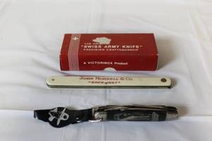 lot 224 image: Collection of 3 Pocket Knives - Victorinox Swiss Army Camping, John Morrell & Co., Hopalong Cassidy