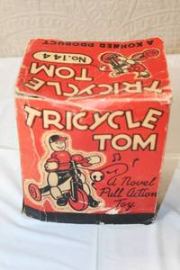 lot 230 image: Vintage Tricycle Tom Wooden Pull Toy with Original Box