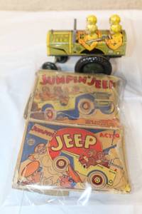 lot A-231 image: Vintage Louis Marx Tin Wind-Up Jumpin Jeep Toy with Original Boxes