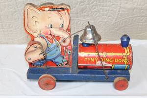 lot 233 image: Vintage Tin Litho Tiny Ding Dong Elephant Pull Toy with Bell