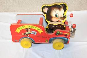 lot 234 image: Vintage Fisher Price Teddy Trucker Pull Toy Bruin 711