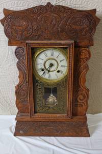 lot 244 image: Antique Ornate Wooden Mantel Clock with Key and Detached Decorative Panel