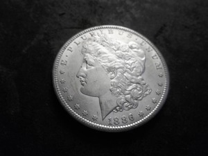 lot 20 image: 1886 S Morgan Silver Dollar