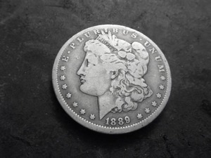 lot 24 image: 1889 O Morgan Silver Dollar