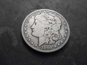 lot 25 image: 1890 CC Morgan Silver Dollar
