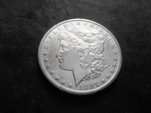 lot 31 image: 1897 S Morgan Silver Dollar