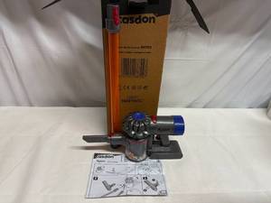 lot 32 image: Toy Dyson Vacuum
