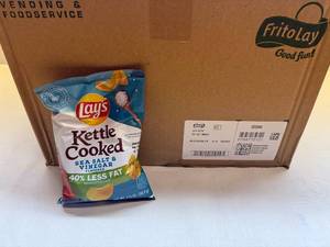 lot 55 image: 64 Lays Kettle Salt & Vinegar Chips