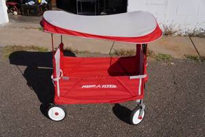 lot 38 image: Radio Flyer Wagon with Roof