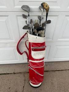 lot 64 image: Vintage Golf Bag with Assorted Golf Clubs