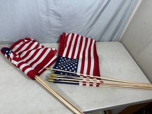 lot 27 image: 20 New American Flags with Sticks - 12 x 18 inches.