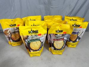lot 100 image: 9 Lodge Cast Iron Skillet Corn Bread Mixes