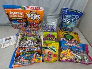 lot 106 image: Assorted Candy, Dots, Fruit Chews, Blow Pops, Sugar Babies, Tootise Pops, and More