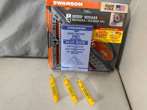 lot 181 image: New 7 inch Speed Square with Folding Utility Knife and 3 Line Levels