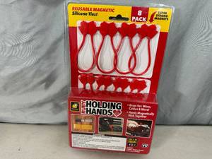 lot 190 image: New 8 Pack of Ruby Holding Hands Magnetic Silicone Ties  Organizers