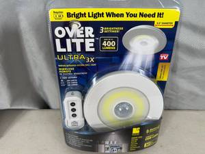 lot 134 image: New Over Lite Remote Controlled  Motion Activated Light Fixture