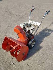 lot 8 image: Vintage Ariens Sno-Thro Snowblower