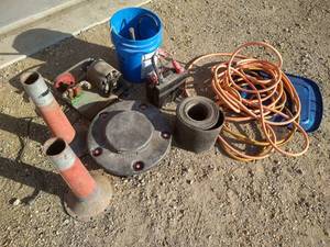 lot 70 image: Large Misc. Hoses, Jumper Cables, Etc