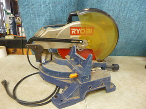 lot 11 image: Ryobi 12 Compound Miter Saw with Laser
