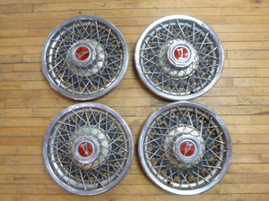 lot 51 image: Set of Pontiac Hub Caps