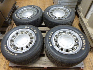 lot 58 image: 4 StarFire SX 5000 Tires on Rims with Ford Hub Caps