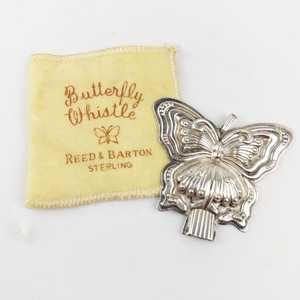 lot 8 image: Reed & Barton Sterling Silver Butterfly Whistle Pendant with Pouch