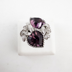 lot 38 image: Sarah Coventry Open Shank Ring with Purple Stones and Floral Setting. Size 7.