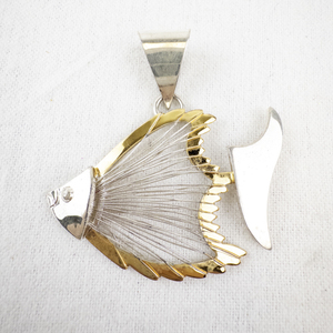 lot 105 image: Two-Tone Wire Wrapped Fish Pendant.