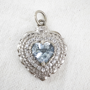 lot 107 image: Sterling Silver Heart Pendant with Aquamarine Stone.