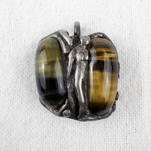 lot 109 image: Vintage Sterling Silver Tigers Eye and Hawks Eye Pendant