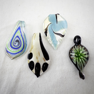 lot 111 image: Set of 4 Art Glass Leaf Pendants Mixed Designs