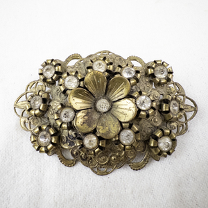 lot 134 image: Vintage Brass Floral Brooch with Rhinestones.