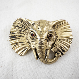 lot 138 image: Vintage Elephant Head Brooch with Red Stone Eyes.