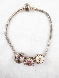 lot 169 image: Pandora Bracelet with 3 Floral Charms.