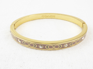 lot 180 image: Coach 62mm Gold Tone Hinged Bangle Bracelet with Crystals