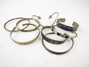 lot 184 image: Collection of 7 Vintage Metal Cuff and Bangle Bracelets